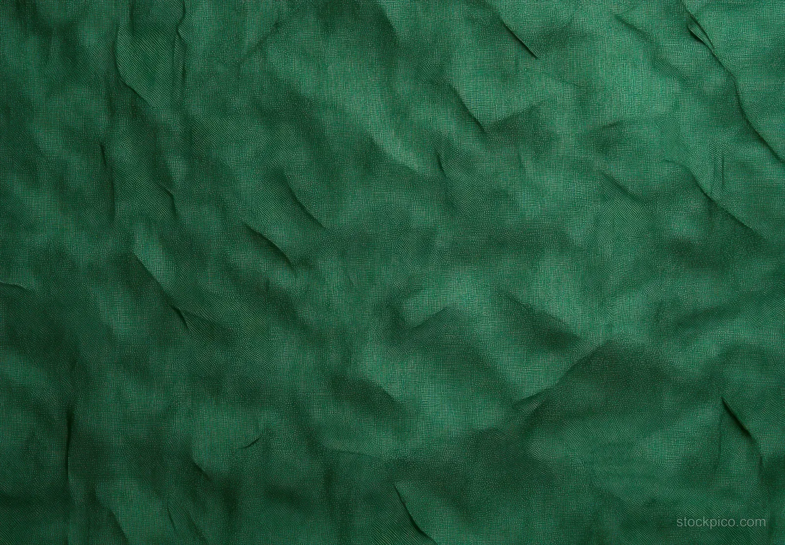 Green textured washi paper background with faint traditional Japanese pattern impressions filling the frame.